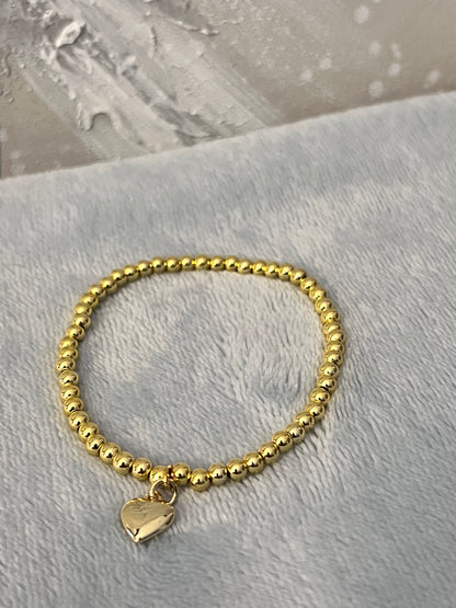 Gold Beaded Stretch Bracelet with Dainty Puffy Heart Charm