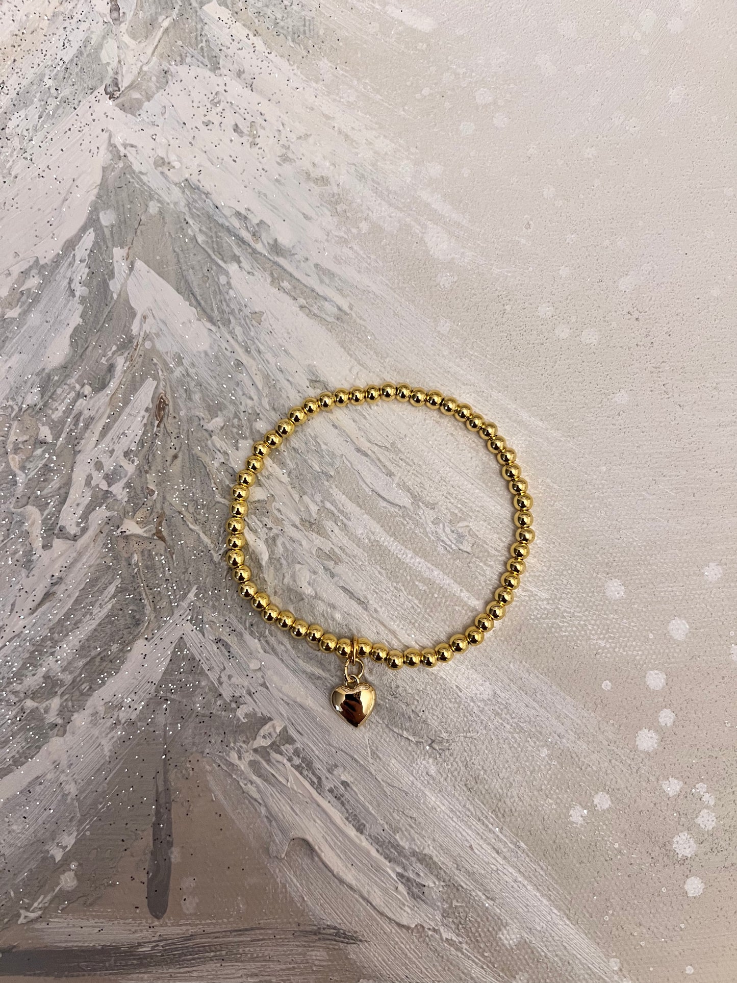 Gold Beaded Stretch Bracelet with Dainty Puffy Heart Charm